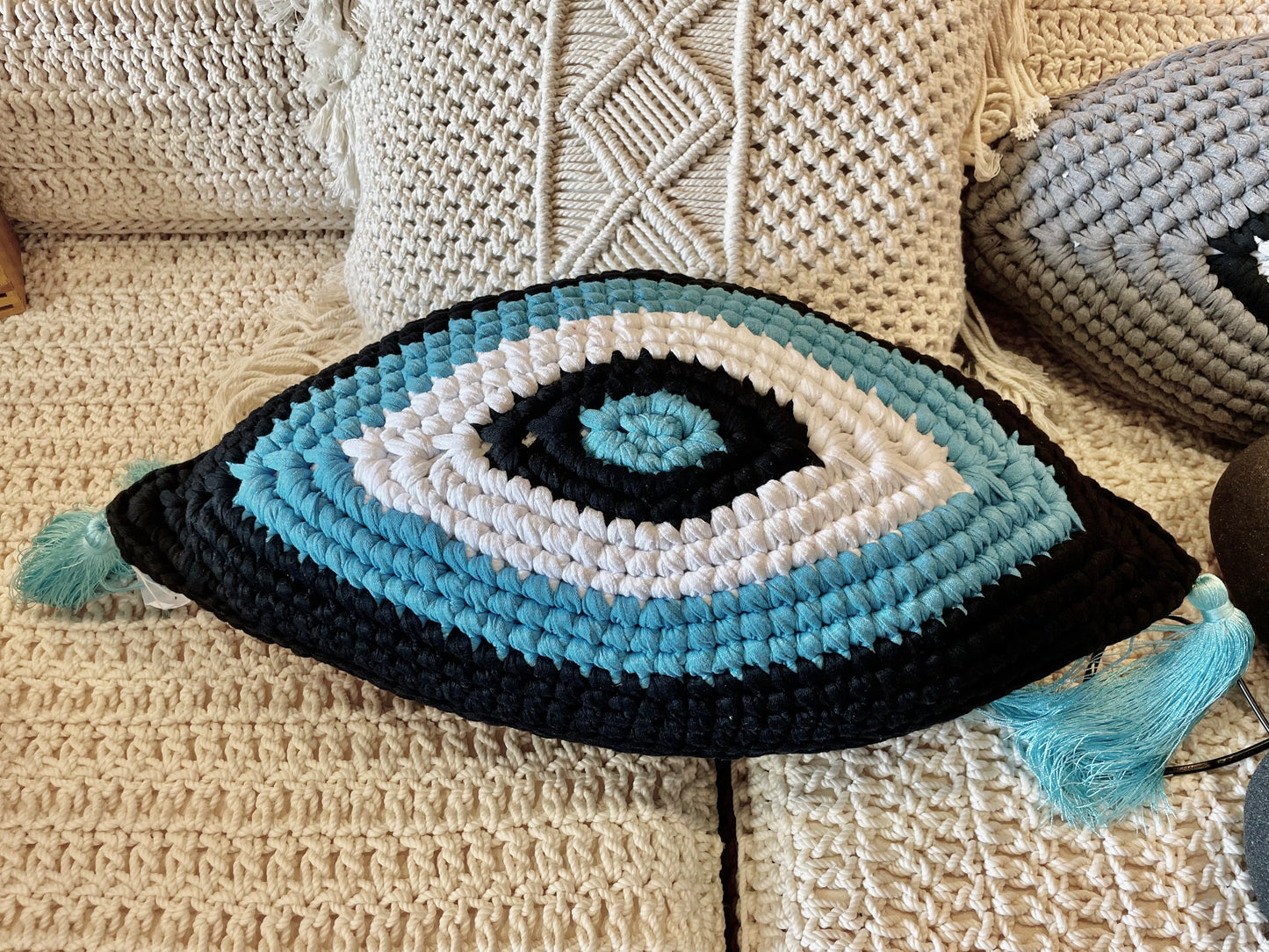 Handmade Macrame Black Eye Cushion with Blue Tassels