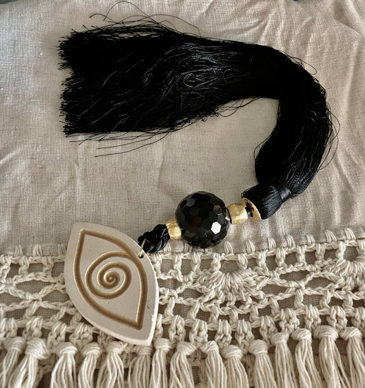 Lucky Charm with White & Gold Ceramic Eye, Black Crystal and Black Silk Tassel