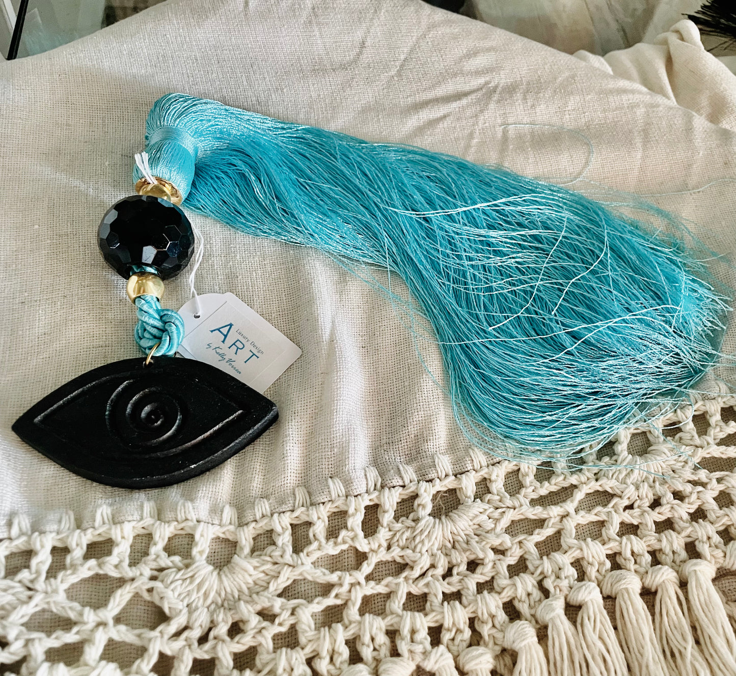 Lucky Charm with Black Ceramic Eye, Black Crystal and Blue Silk Tassel