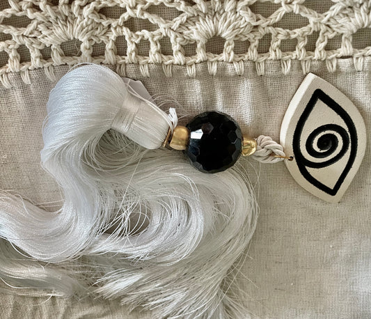 Lucky Charm with White & Black Ceramic Eye, Black Crystal and White Silk Tassel